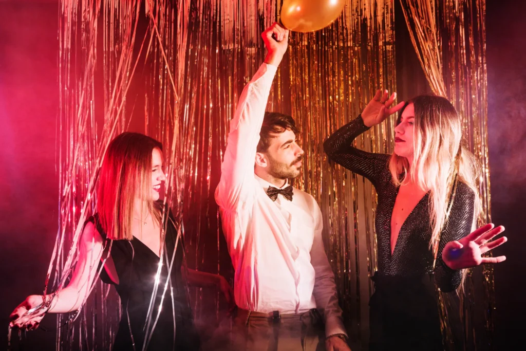Group of friends dancing at a New Year’s party