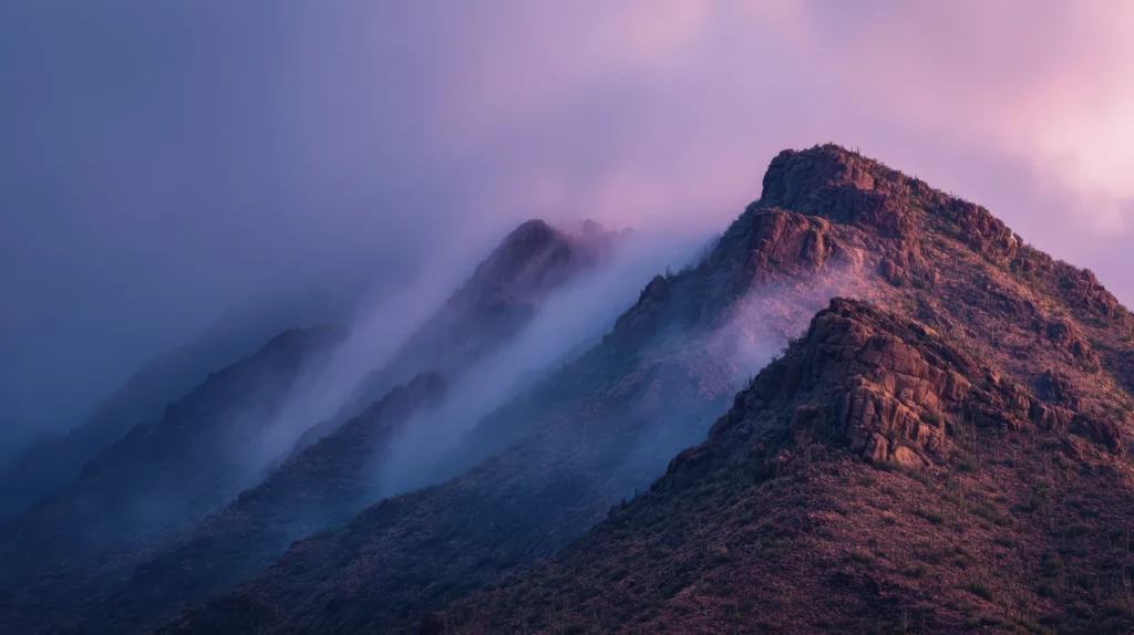Misty mountain peaks at dawn
