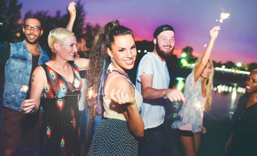 People celebrating outdoors at a party